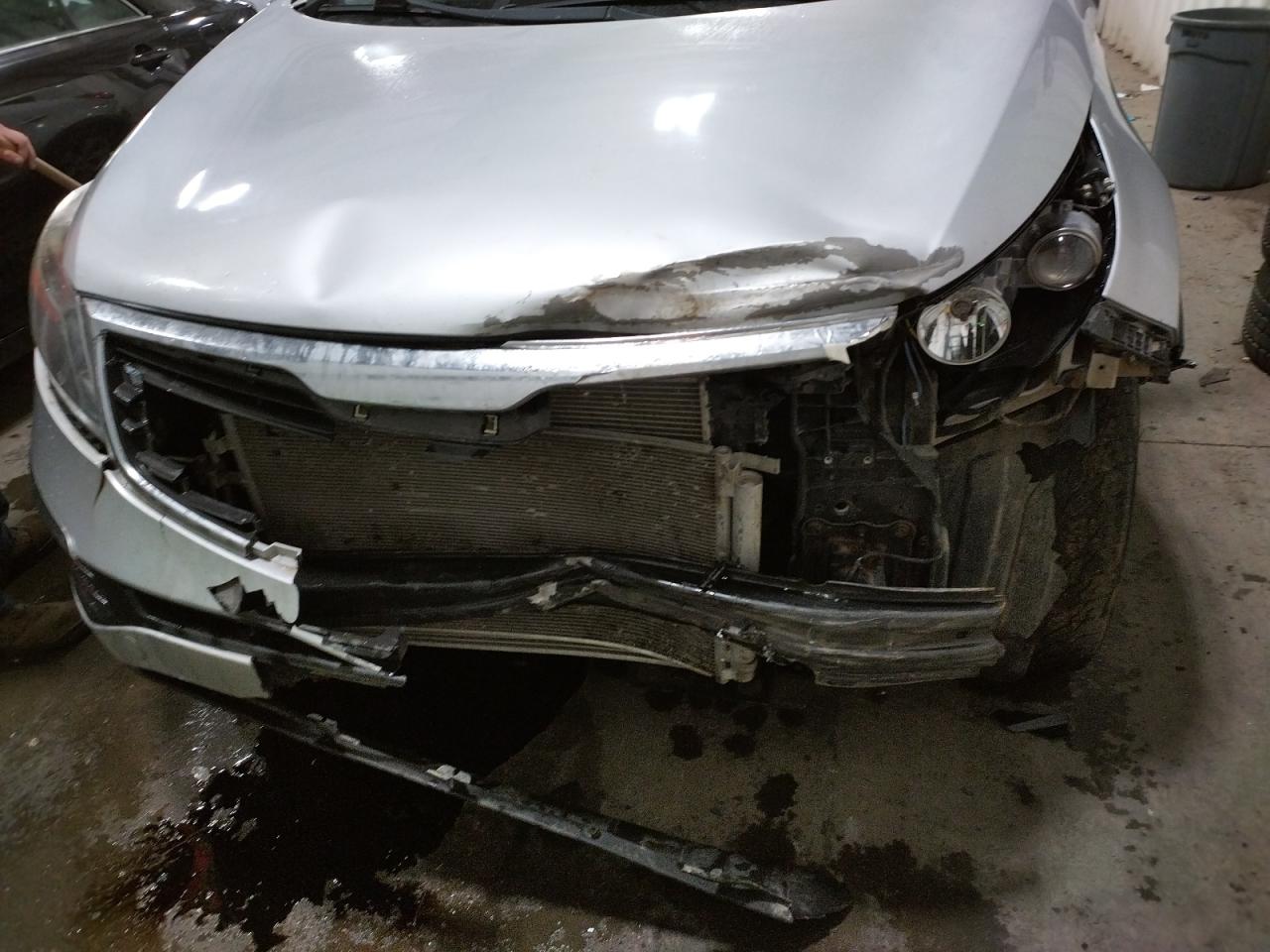 Photo 9 from auction – 2011 KIA SPORTAGE L with VIN KNDPBCA28B7052867