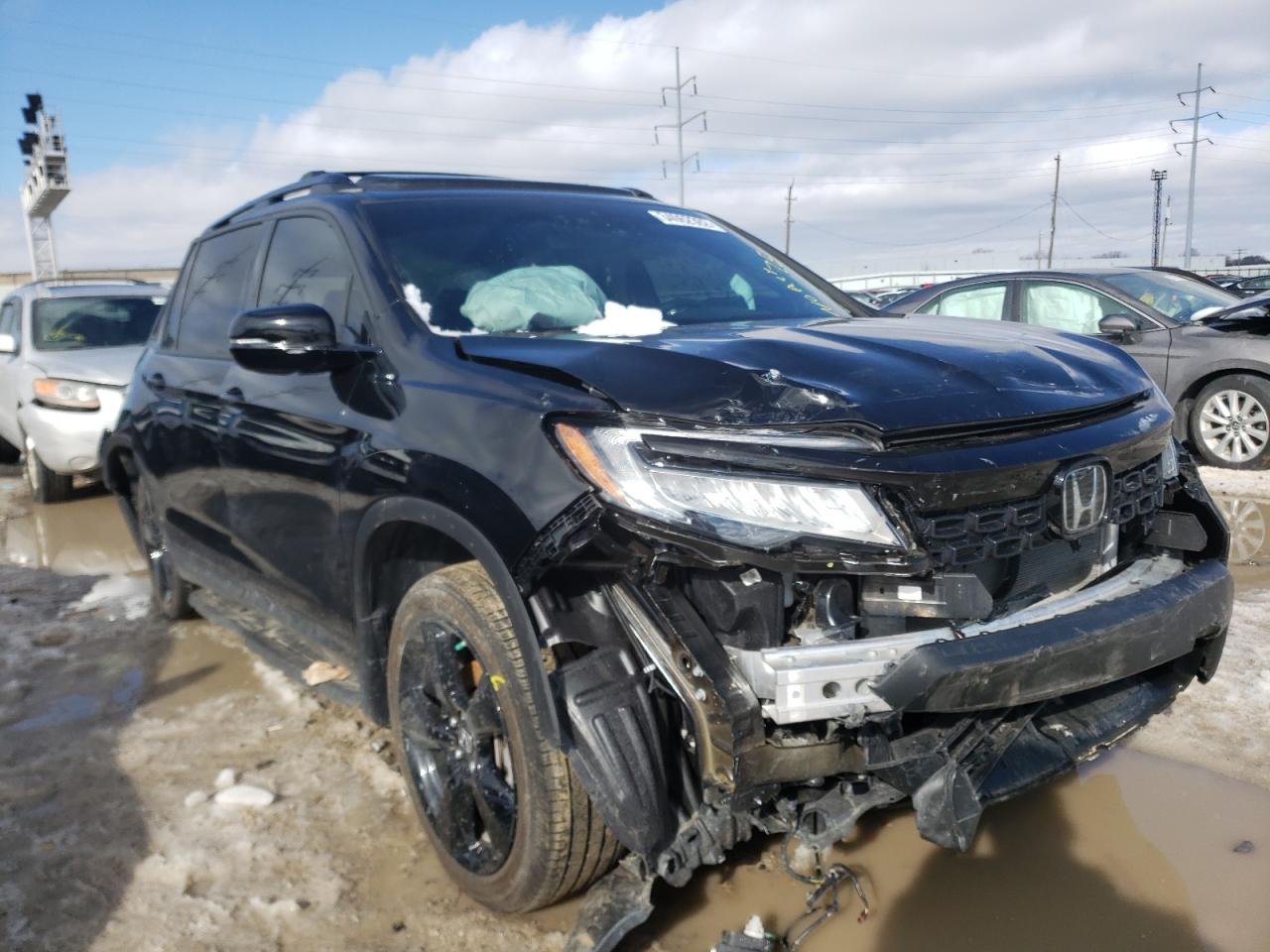 HONDA PASSPORT E 2020 with VIN 5FNYF8H03LB019488 - Photo from auction