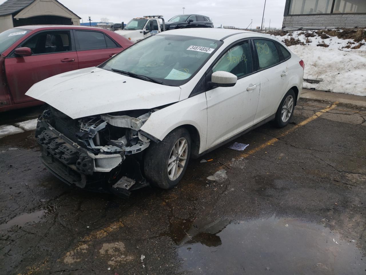 Photo 2 from auction – 2018 FORD FOCUS SE with VIN 1FADP3F26JL216108