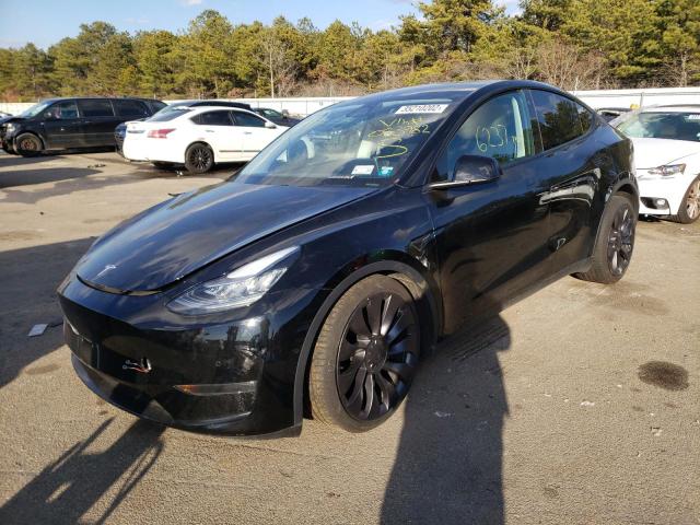 Photo 2 from auction – 2021 TESLA MODEL Y with VIN 5YJYGDEF1MF083982
