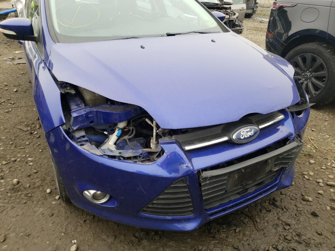 Photo 9 from auction – 2013 FORD FOCUS SE with VIN 1FADP3F26DL325883