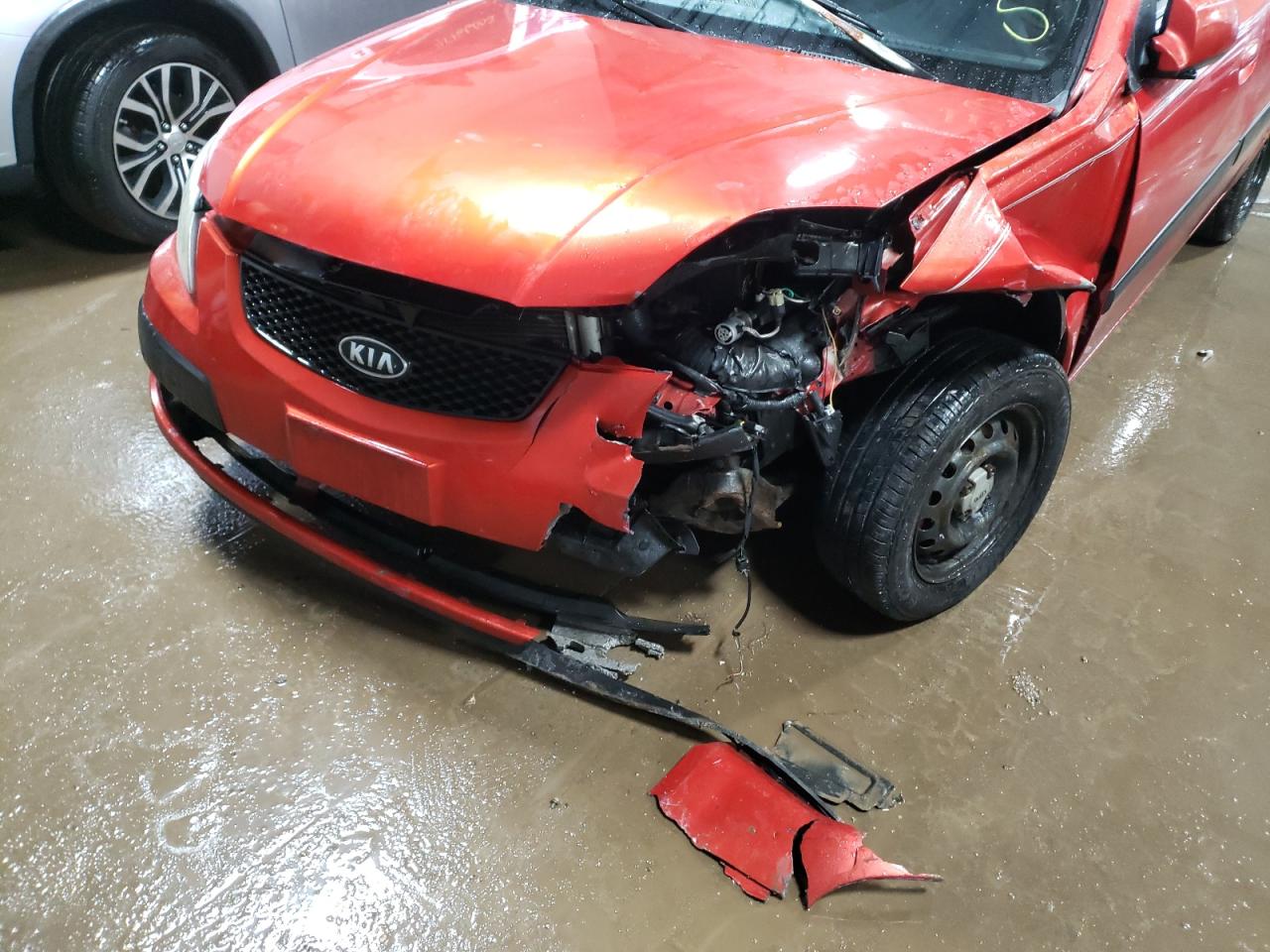 Photo 9 from auction – 2006 KIA RIO with VIN KNADE123966102285