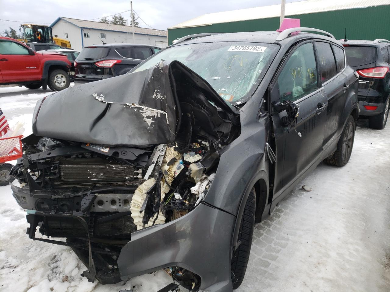 Photo 2 from auction – 2017 FORD ESCAPE TIT with VIN 1FMCU9JD0HUE19702