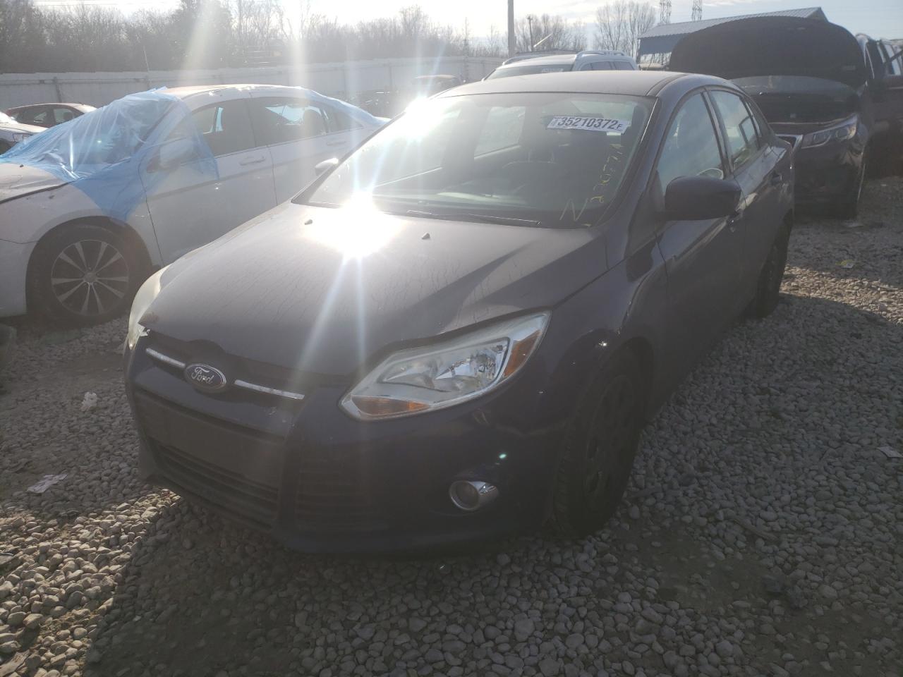 Photo 2 from auction – 2012 FORD FOCUS SE with VIN 1FAHP3F24CL117744