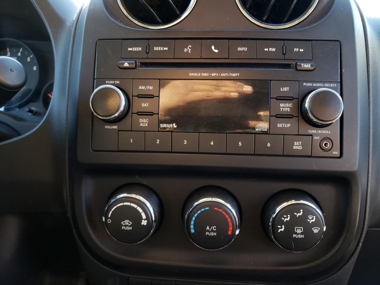 Photo 9 from auction – 2012 JEEP COMPASS LA with VIN 1C4NJDEB8CD572550