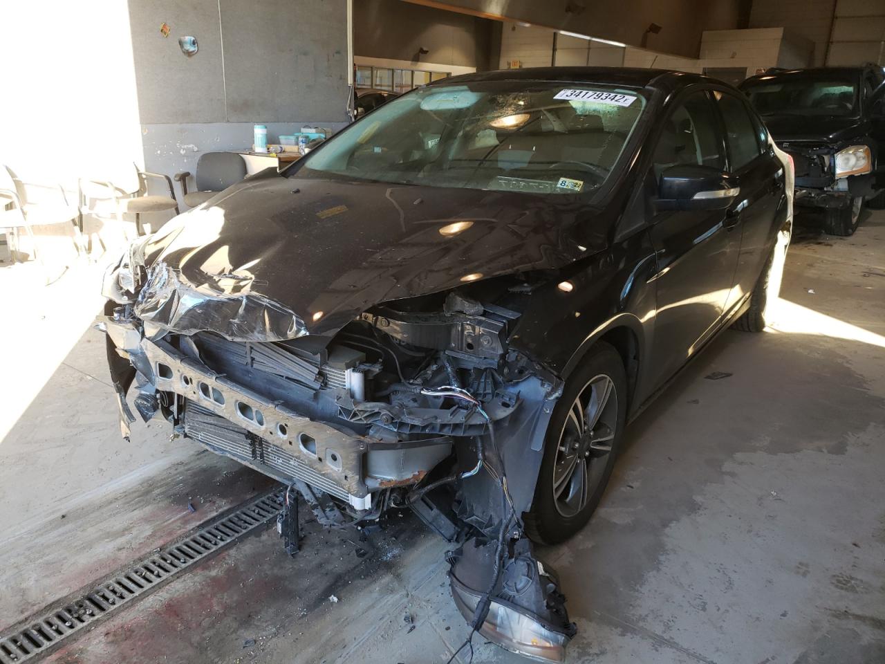 Photo 2 from auction – 2014 FORD FOCUS SE with VIN 1FADP3F29EL386338