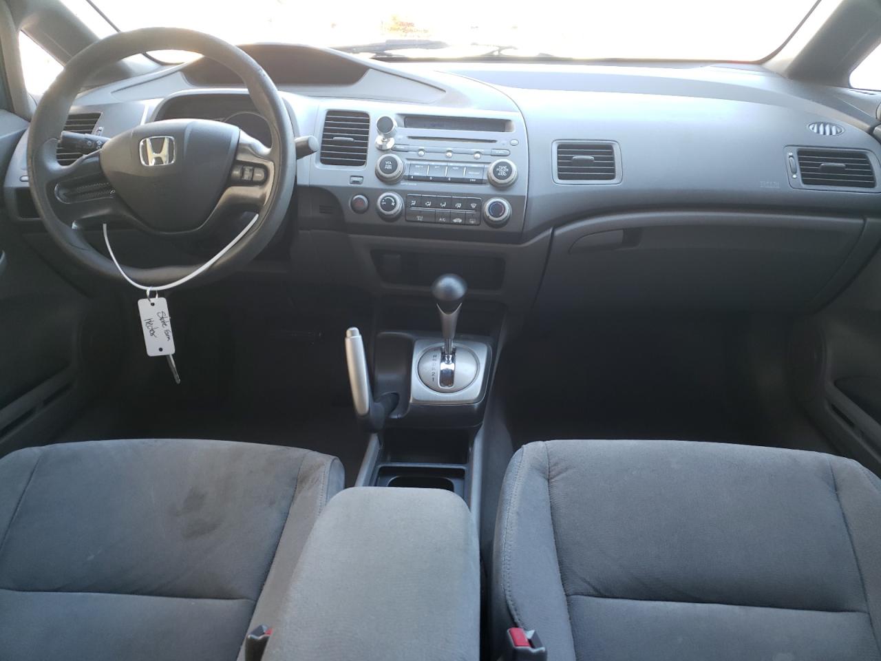 Photo 9 from auction – 2006 HONDA CIVIC LX with VIN 1HGFA16596L055474