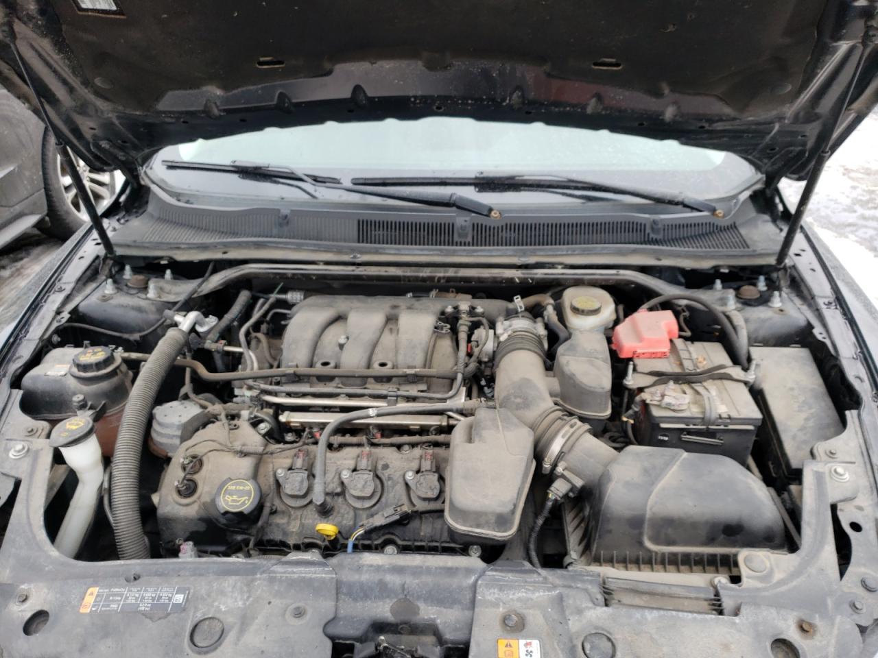 Photo 7 from auction – 2015 FORD TAURUS SE with VIN 1FAHP2D85FG130243
