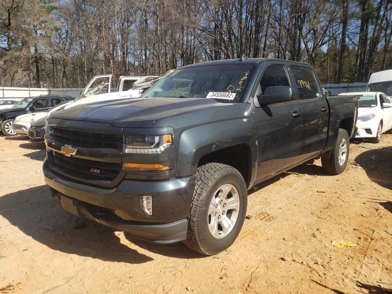 Photo 2 from auction – 2018 CHEVROLET SILVERADO with VIN 3GCUKREC0JG313520