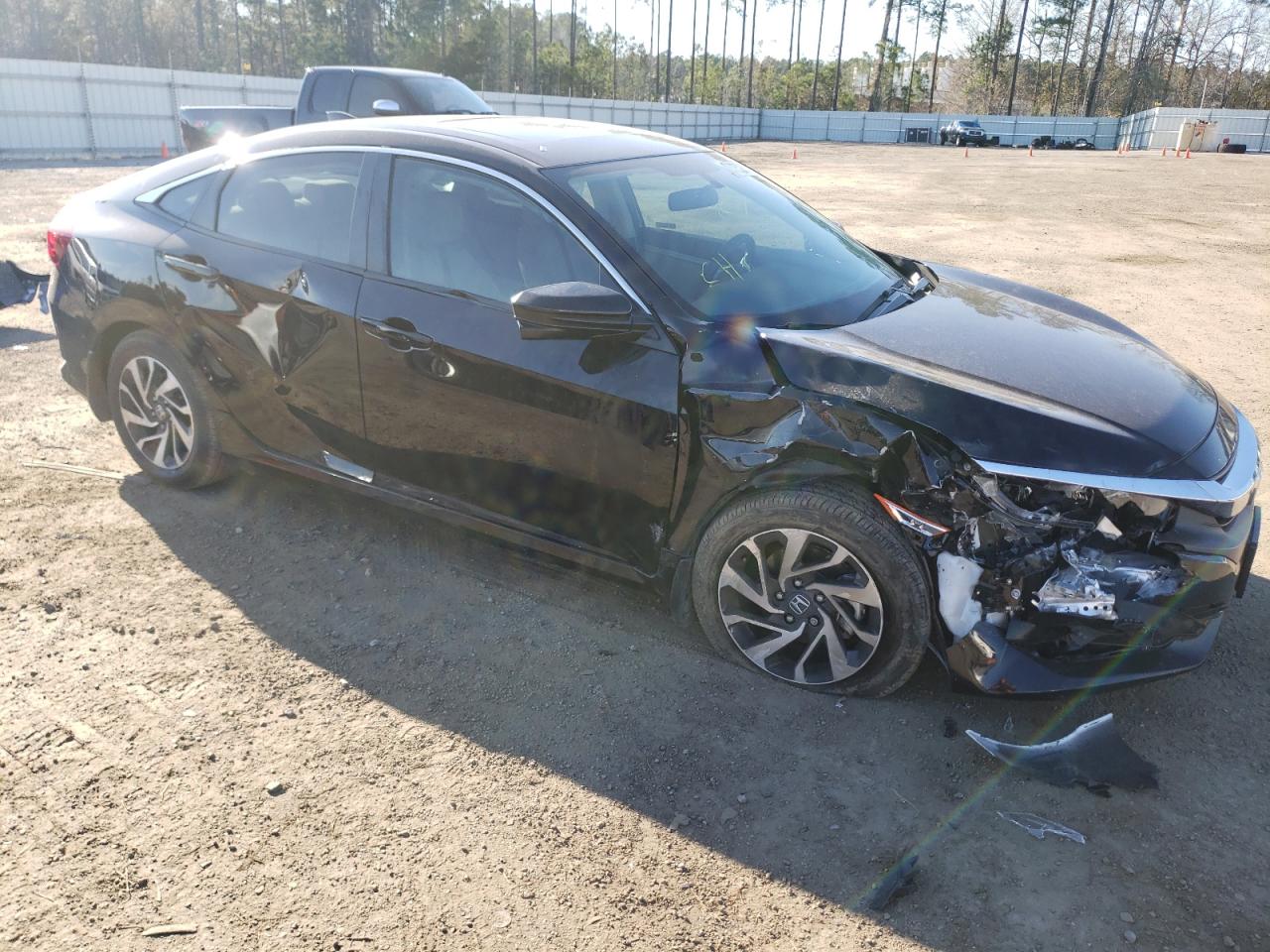 HONDA CIVIC EX 2018 with VIN 19XFC2F74JE039202 - Photo from auction