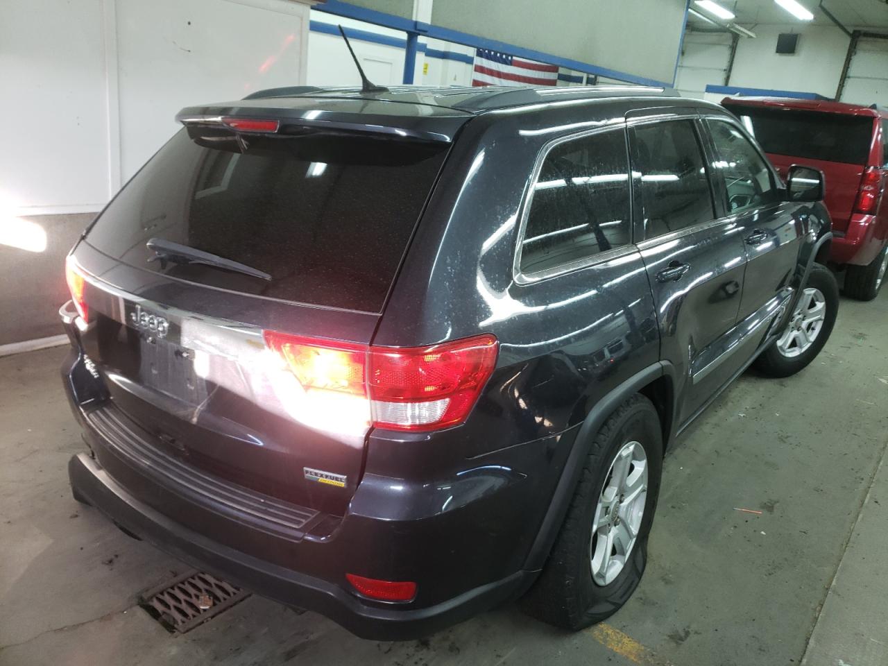 Photo 4 from auction – 2012 JEEP GRAND CHER with VIN 1C4RJFAG1CC241877