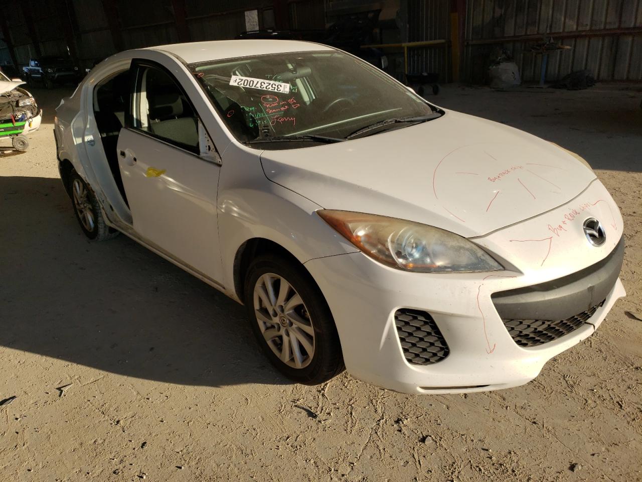 MAZDA 3 I 2012 with VIN JM1BL1V79C1594968 - Photo from auction