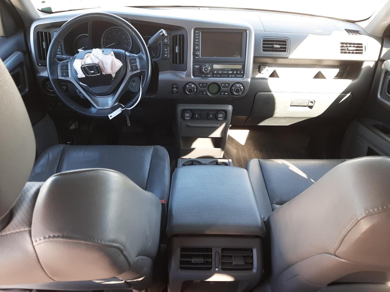 Photo 9 from auction – 2011 HONDA RIDGELINE with VIN 5FPYK1F53BB452283