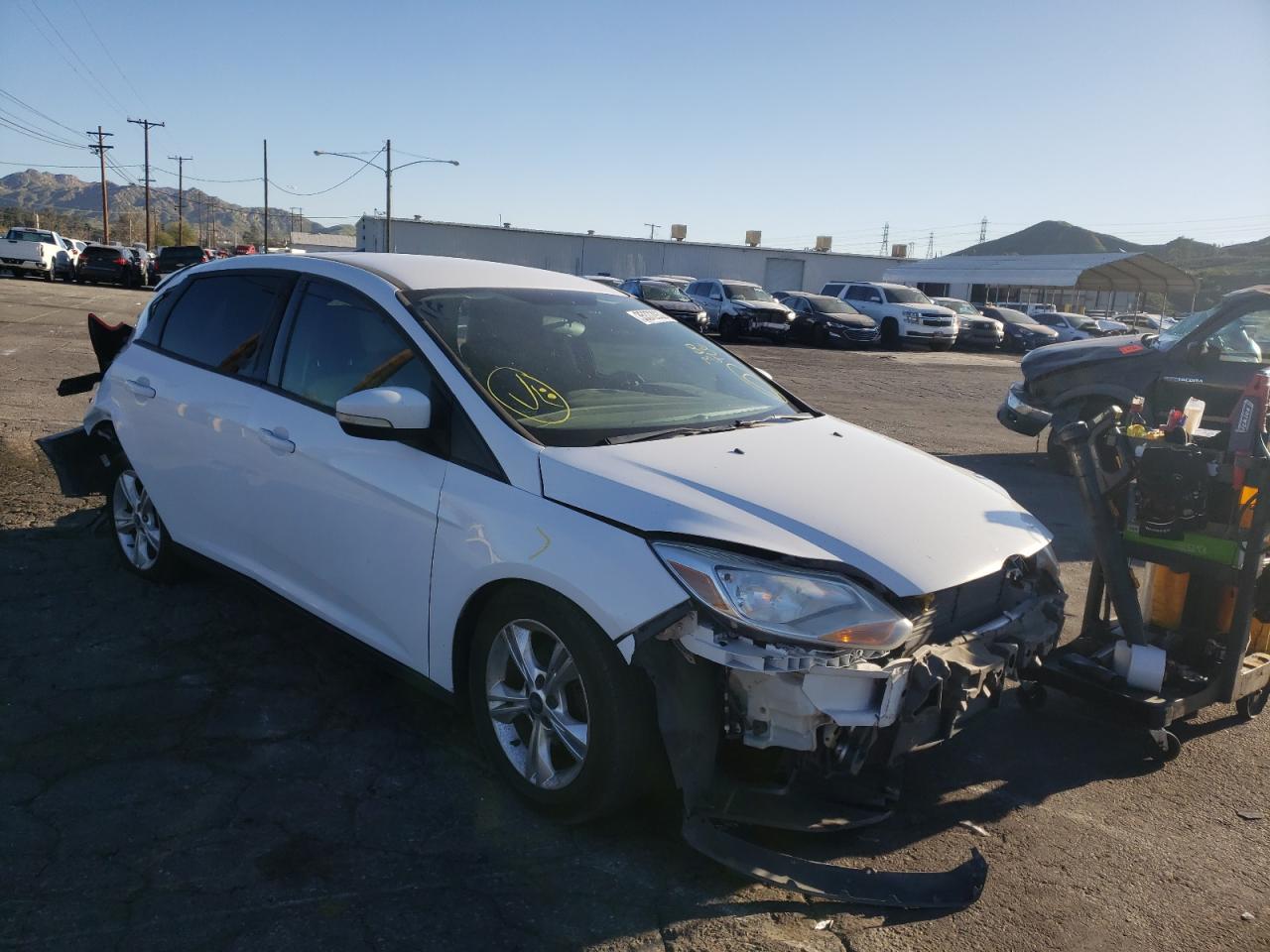 FORD FOCUS SE 2014 with VIN 1FADP3K29EL111560 - Photo from auction