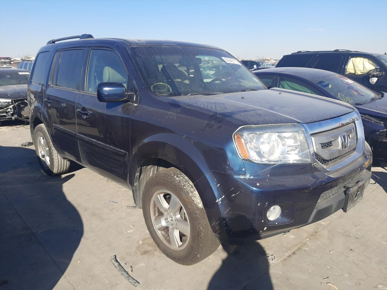 HONDA PILOT EXLN 2011 with VIN 5FNYF4H77BB084509 - Photo from auction