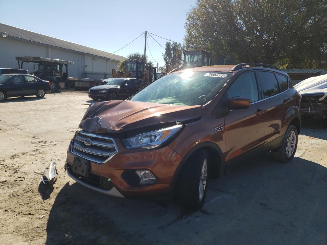 Photo 2 from auction – 2017 FORD ESCAPE SE with VIN 1FMCU9GD8HUB99524