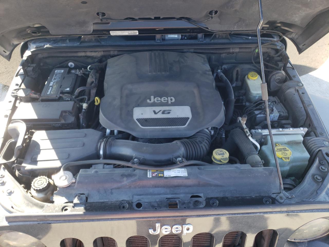 Photo 7 from auction – 2014 JEEP WRANGLER U with VIN 1C4BJWFGXEL234939