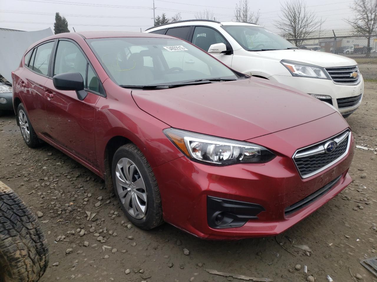 SUBARU IMPREZA 2018 with VIN 4S3GTAA61J3735844 - Photo from auction