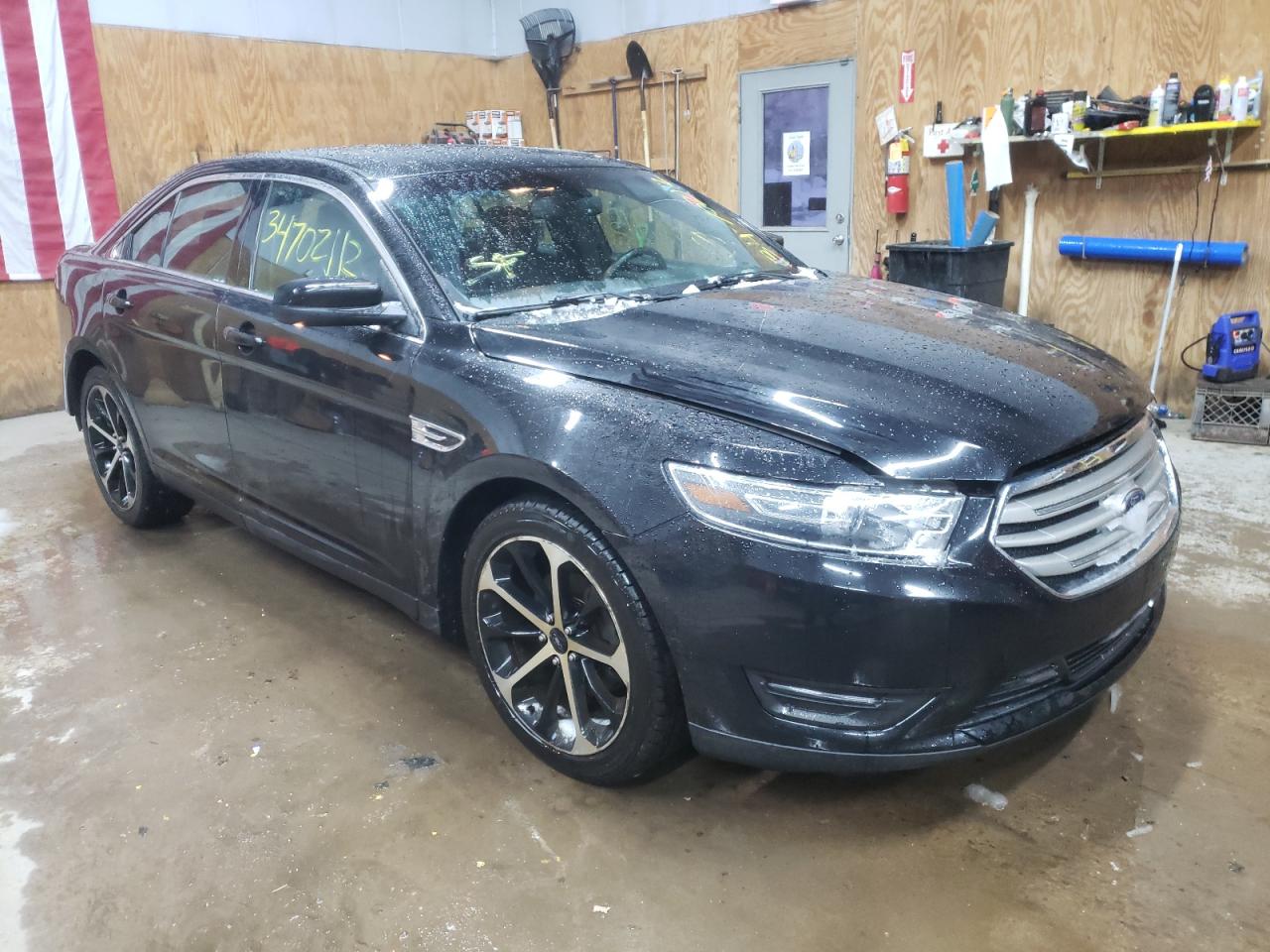 FORD TAURUS SEL 2016 with VIN 1FAHP2H81GG147052 - Photo from auction