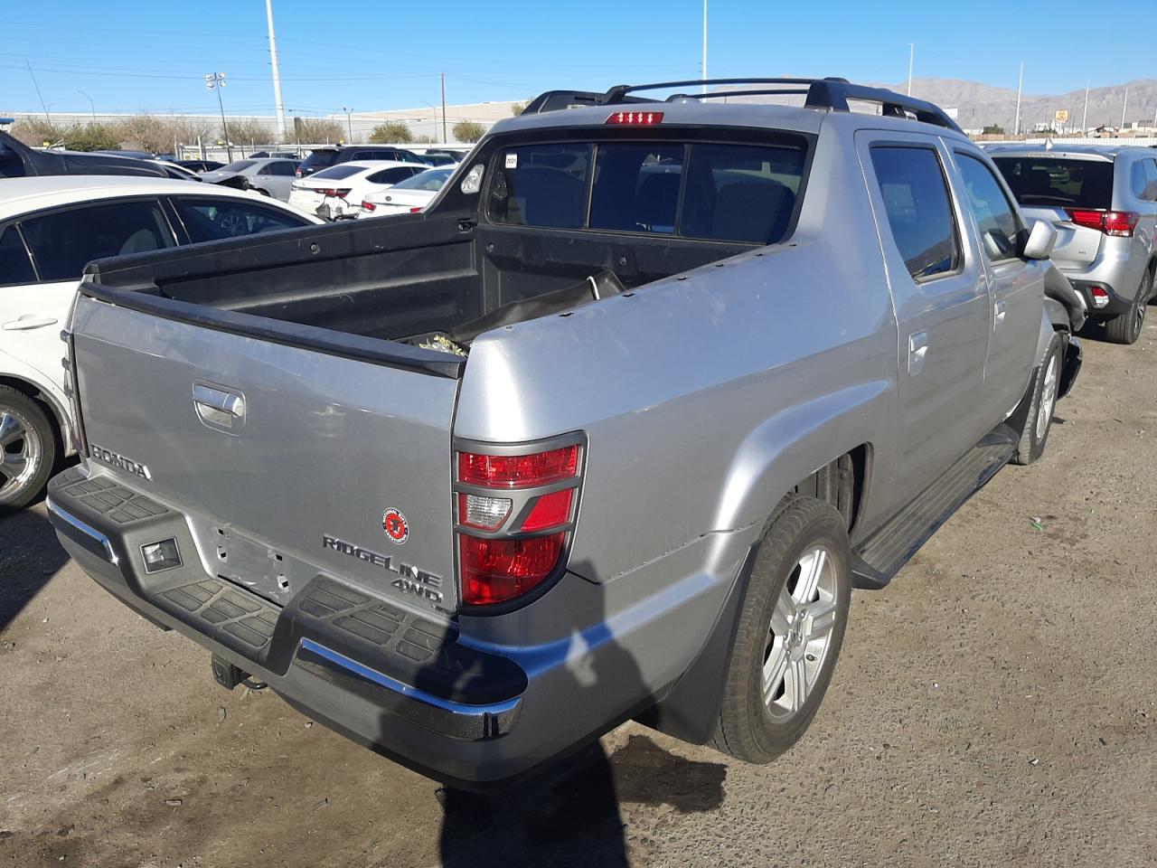 Photo 4 from auction – 2011 HONDA RIDGELINE with VIN 5FPYK1F53BB452283
