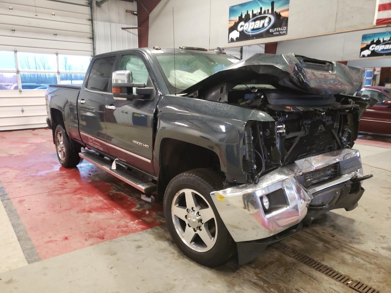 CHEVROLET SILVERADO 2018 with VIN 1GC1KWEY4JF290483 - Photo from auction