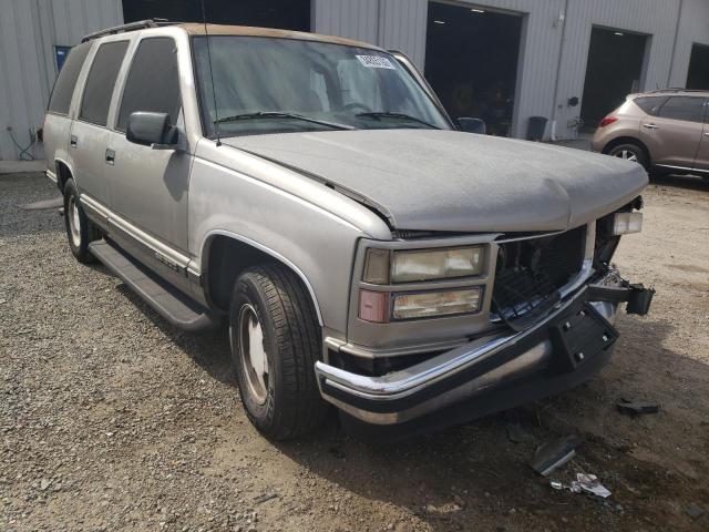 GMC YUKON 1999 with VIN 1GKEC13R7XJ725519 - Photo from auction