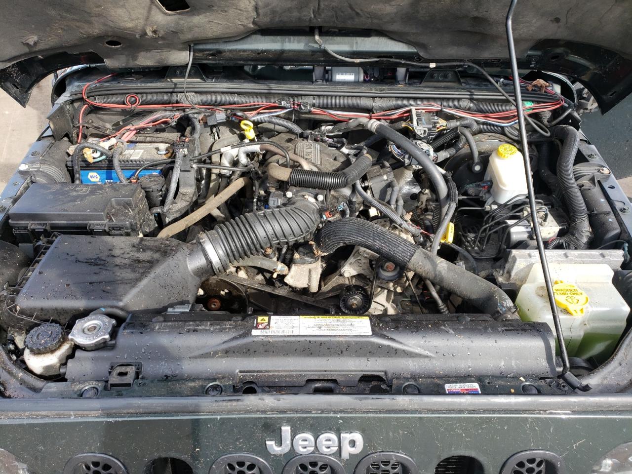 Photo 7 from auction – 2011 JEEP WRANGLER U with VIN 1J4BA5H16BL520523