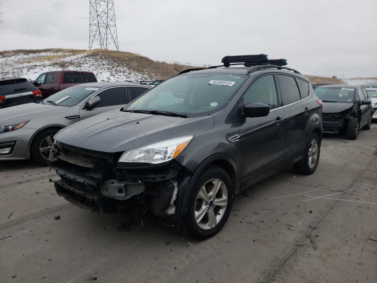 Photo 2 from auction – 2015 FORD ESCAPE SE with VIN 1FMCU9G90FUB30352