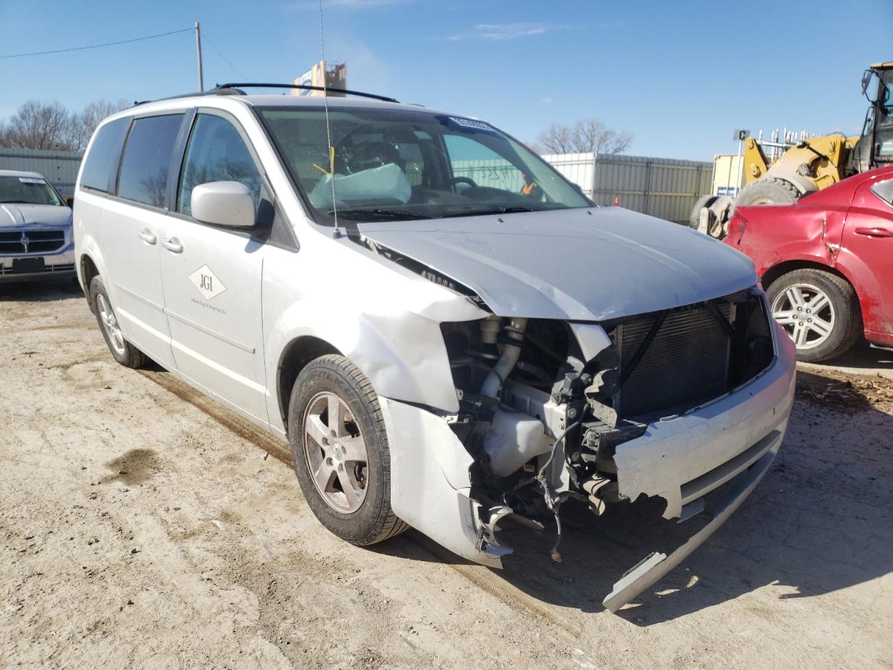 DODGE GRAND CARA 2010 with VIN 2D4RN5D12AR283858 - Photo from auction