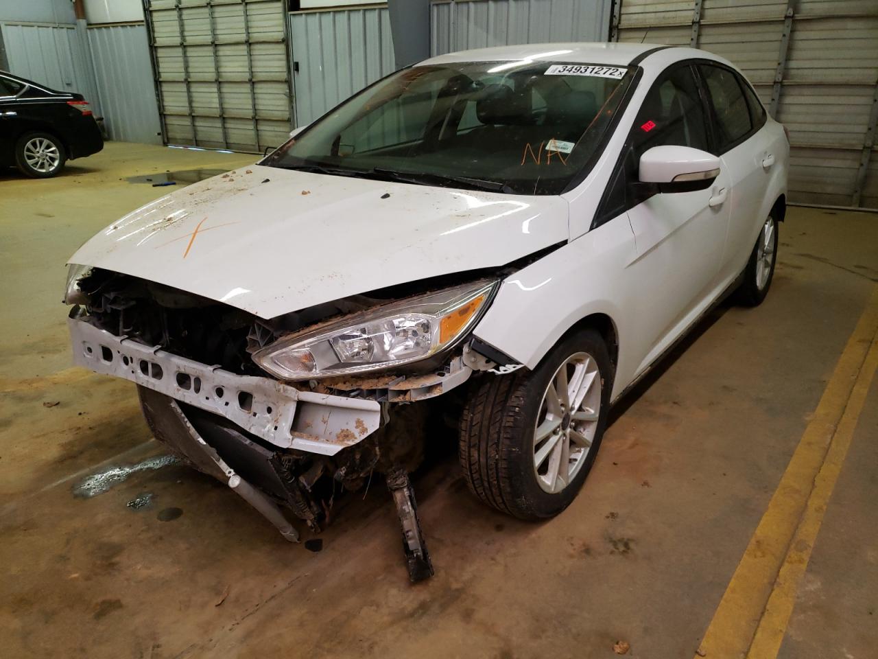 Photo 9 from auction – 2017 FORD FOCUS SE with VIN 1FADP3F28HL234989