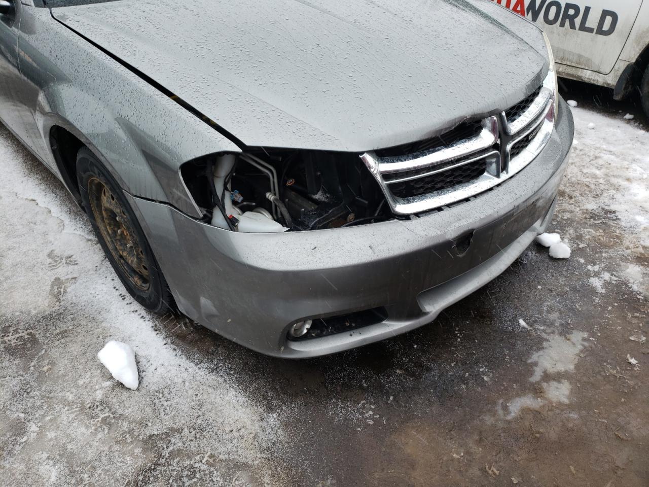 Photo 9 from auction – 2013 DODGE AVENGER SX with VIN 1C3CDZCB5DN692885