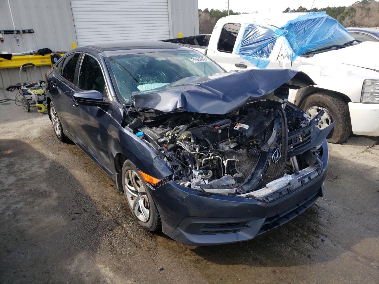 HONDA CIVIC LX 2017 with VIN 19XFC2F5XHE050746 - Photo from auction