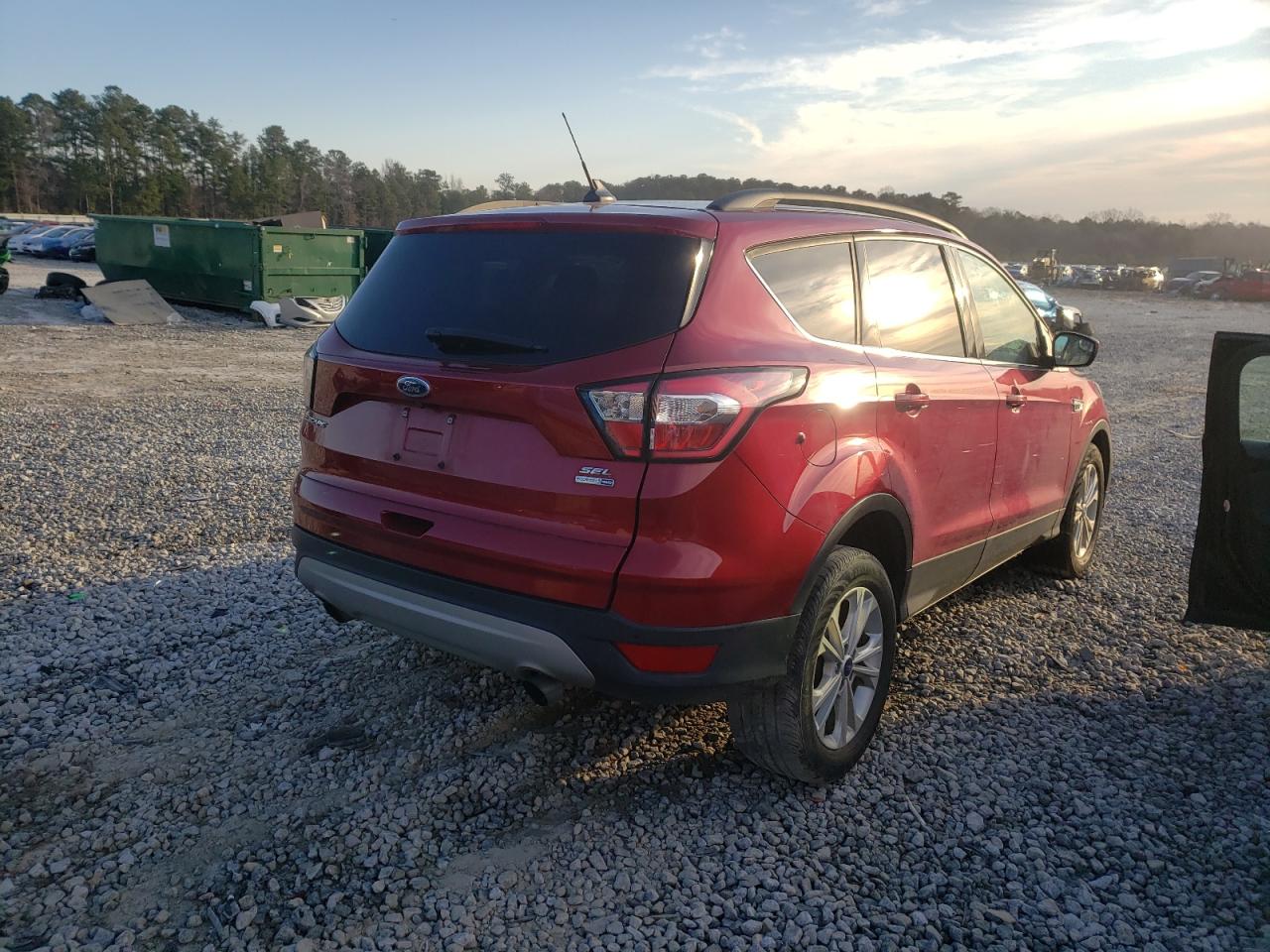 Photo 4 from auction – 2018 FORD ESCAPE SEL with VIN 1FMCU9HD7JUB95579