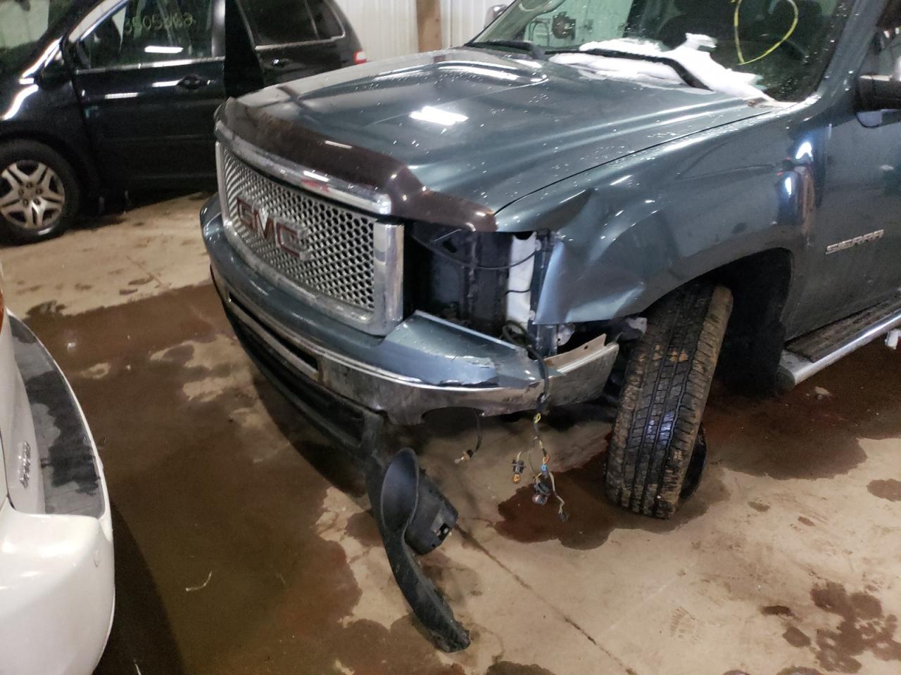 Photo 9 from auction – 2011 GMC SIERRA K15 with VIN 3GTP2VE32BG200885