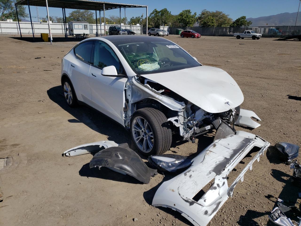 TESLA MODEL Y 2021 with VIN 5YJYGAEE2MF150658 - Photo from auction