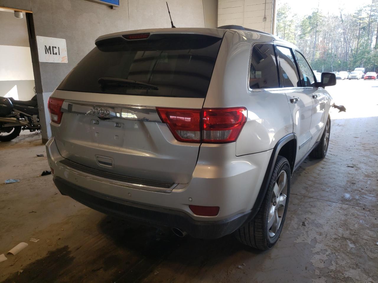 Photo 4 from auction – 2012 JEEP GRAND CHER with VIN 1C4RJFBG0CC254361