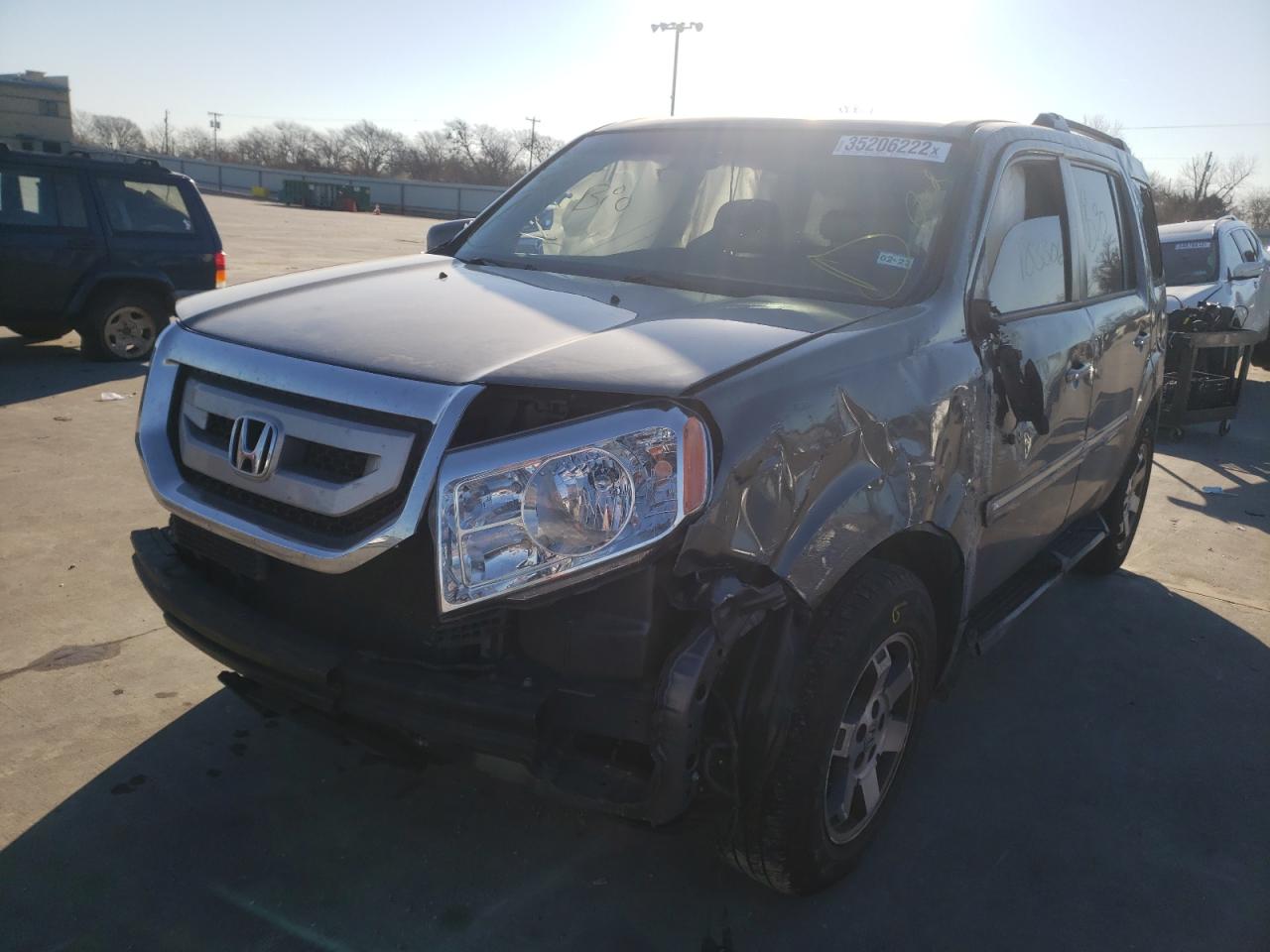 Photo 2 from auction – 2010 HONDA PILOT TOUR with VIN 5FNYF3H89AB022661