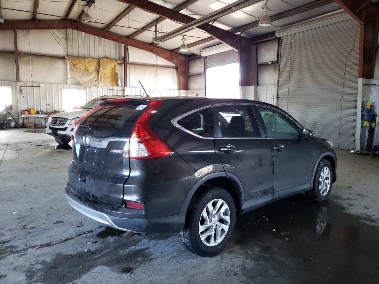 Photo 4 from auction – 2015 HONDA CR-V EX with VIN 5J6RM4H56FL081591
