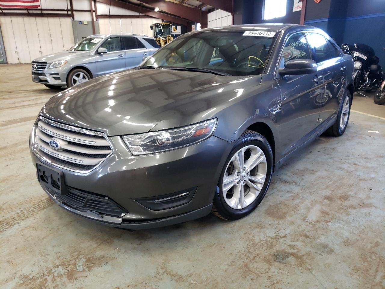 Photo 2 from auction – 2015 FORD TAURUS SEL with VIN 1FAHP2H87FG182192