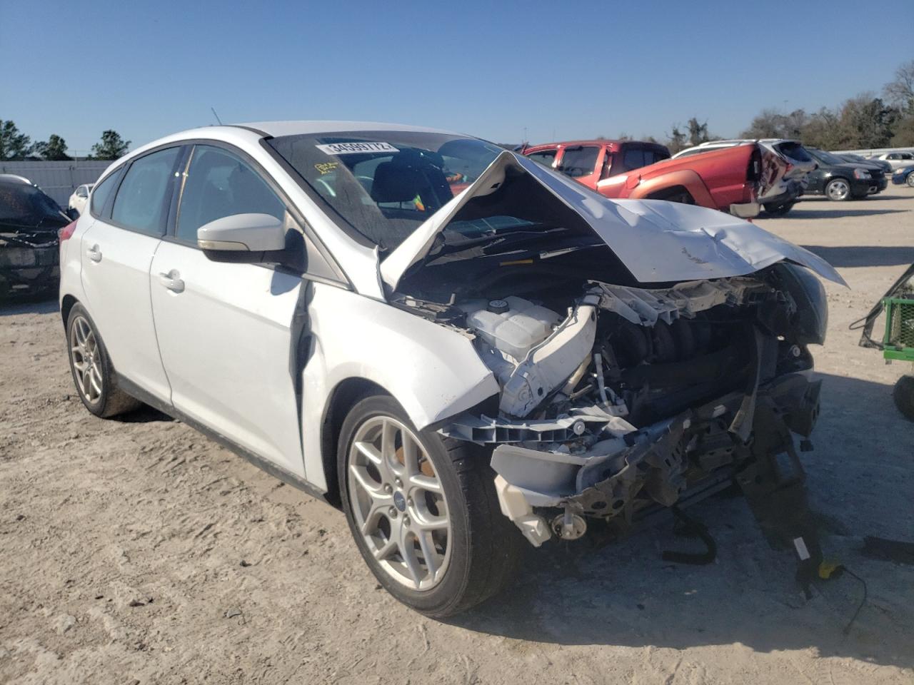 FORD FOCUS SE 2015 with VIN 1FADP3K28FL302372 - Photo from auction