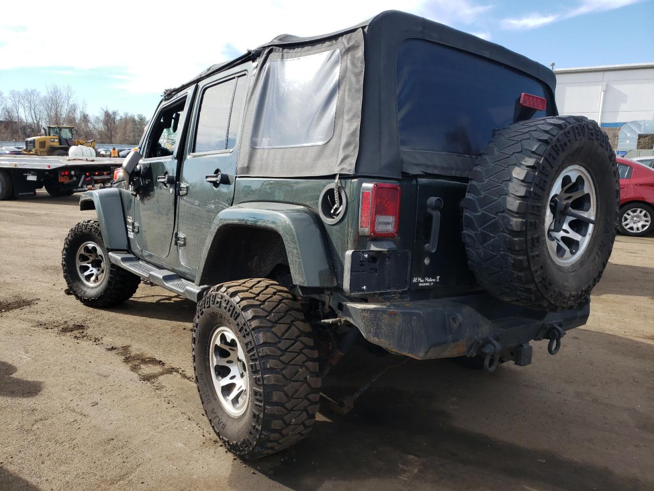 Photo 3 from auction – 2011 JEEP WRANGLER U with VIN 1J4BA5H16BL520523