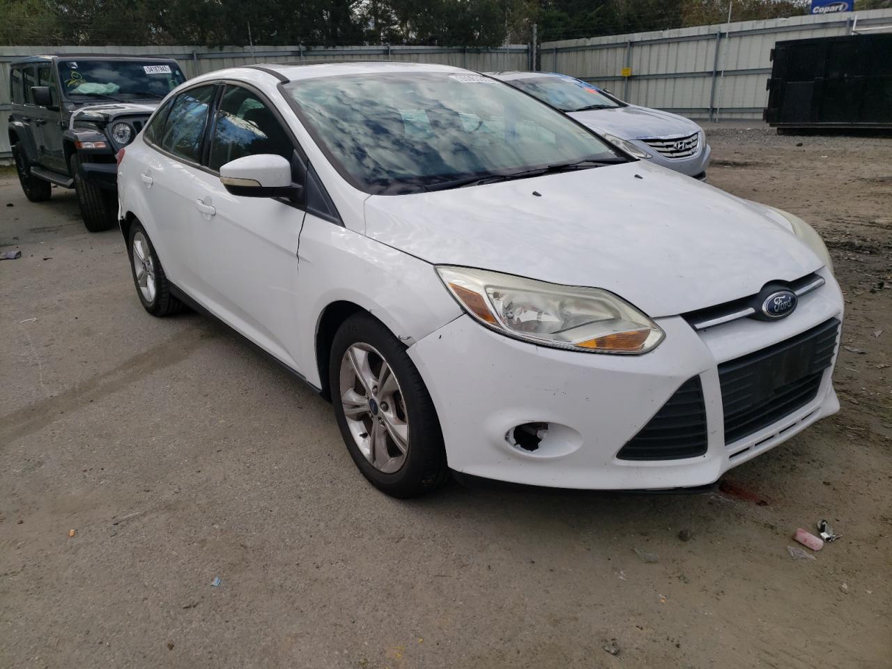 FORD FOCUS SE 2014 with VIN 1FADP3F25EL317680 - Photo from auction