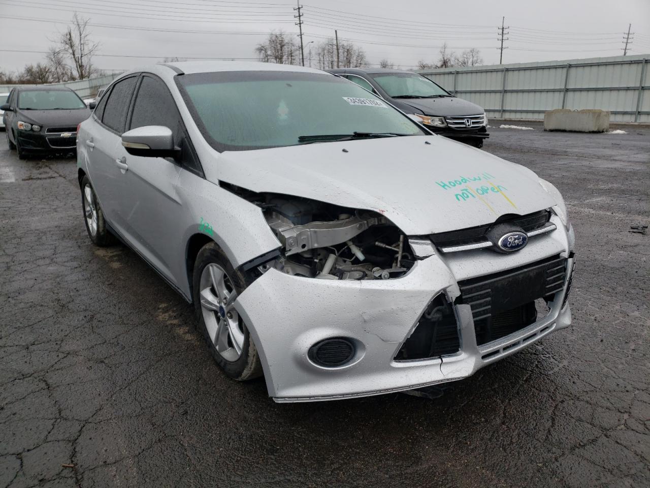 Photo 9 from auction – 2014 FORD FOCUS SE with VIN 1FADP3F23EL256197