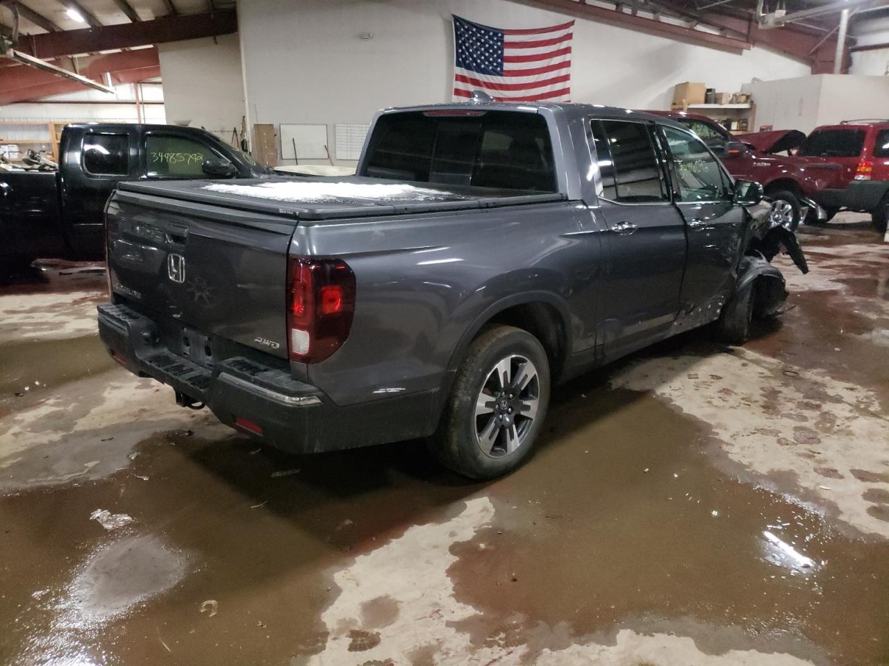 Photo 4 from auction – 2018 HONDA RIDGELINE with VIN 5FPYK3F72JB008582