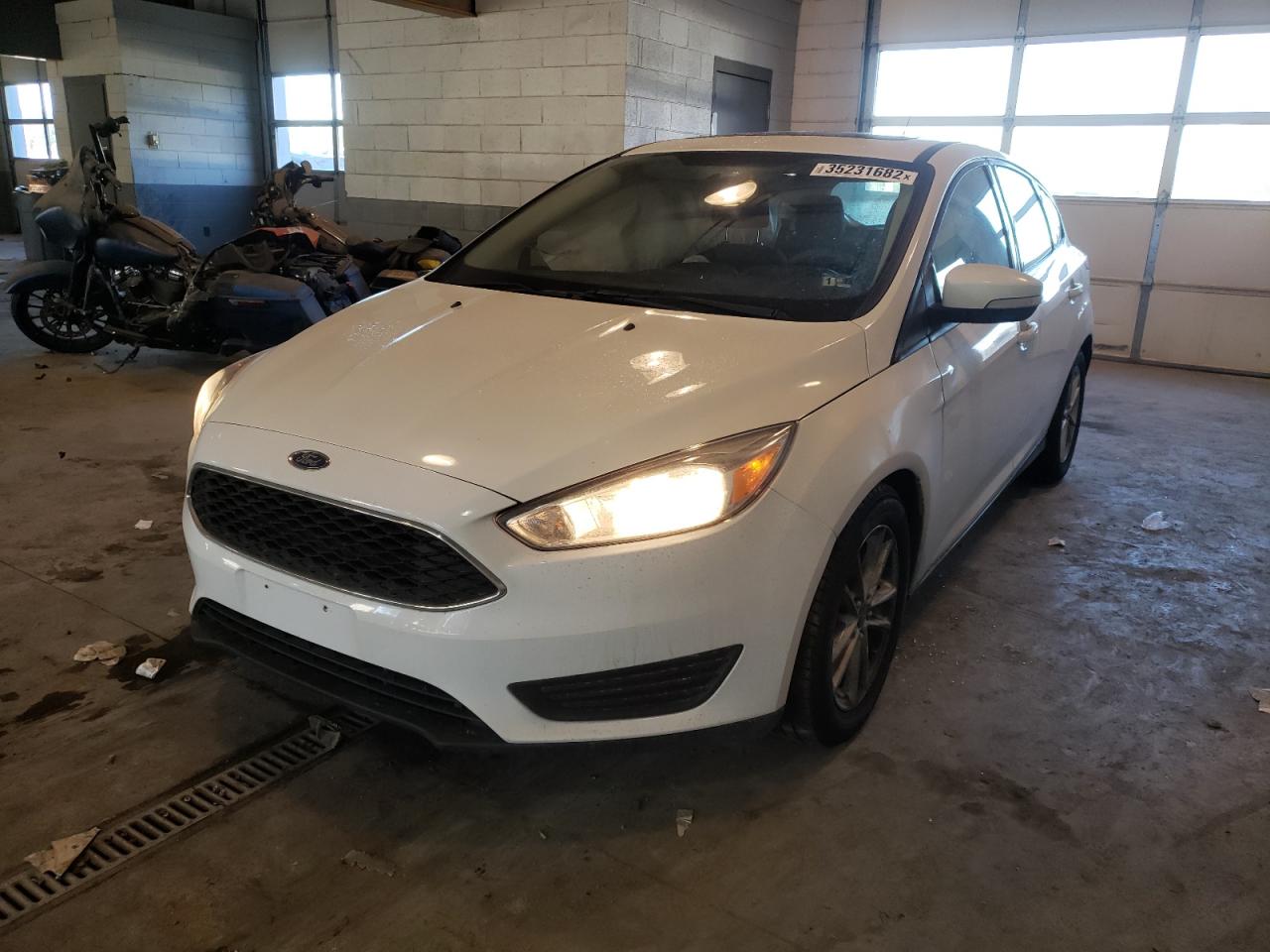 Photo 2 from auction – 2016 FORD FOCUS SE with VIN 1FADP3K28GL203777
