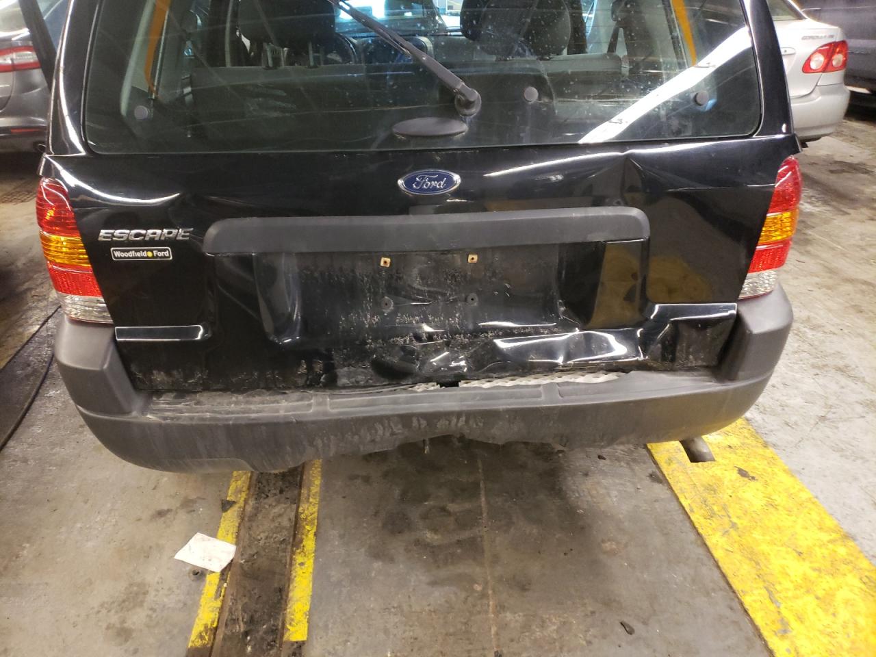 Photo 9 from auction – 2004 FORD ESCAPE LIM with VIN 1FMYU021X4DA06170