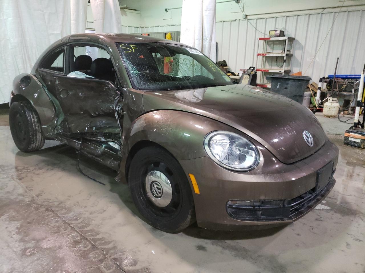 VOLKSWAGEN BEETLE 2012 مع رقم تعريف المركبة 3VWJP7AT2CM640131 - صورة من المزاد