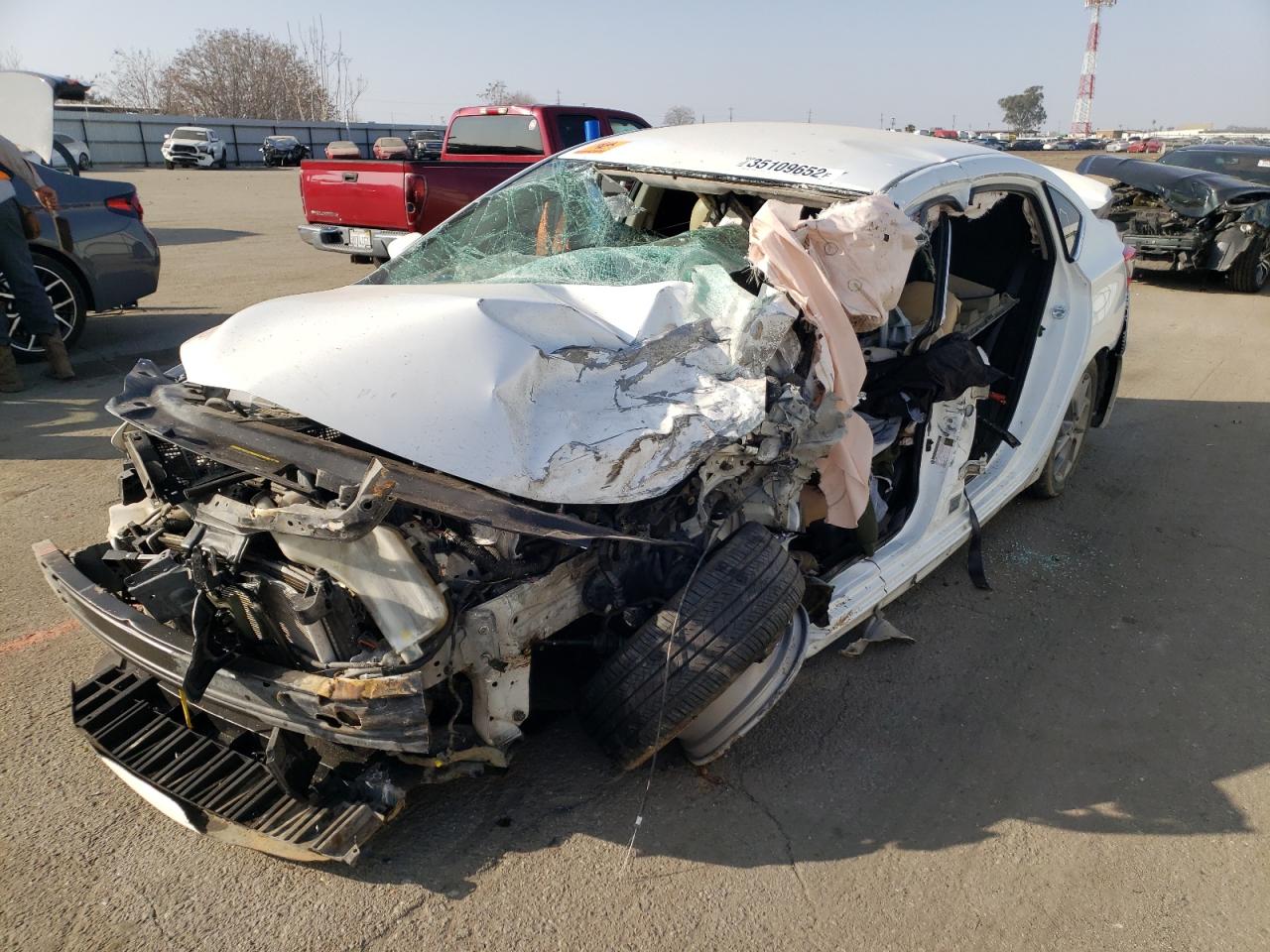 Photo 2 from auction – 2014 NISSAN SENTRA S with VIN 3N1AB7AP2EY284542