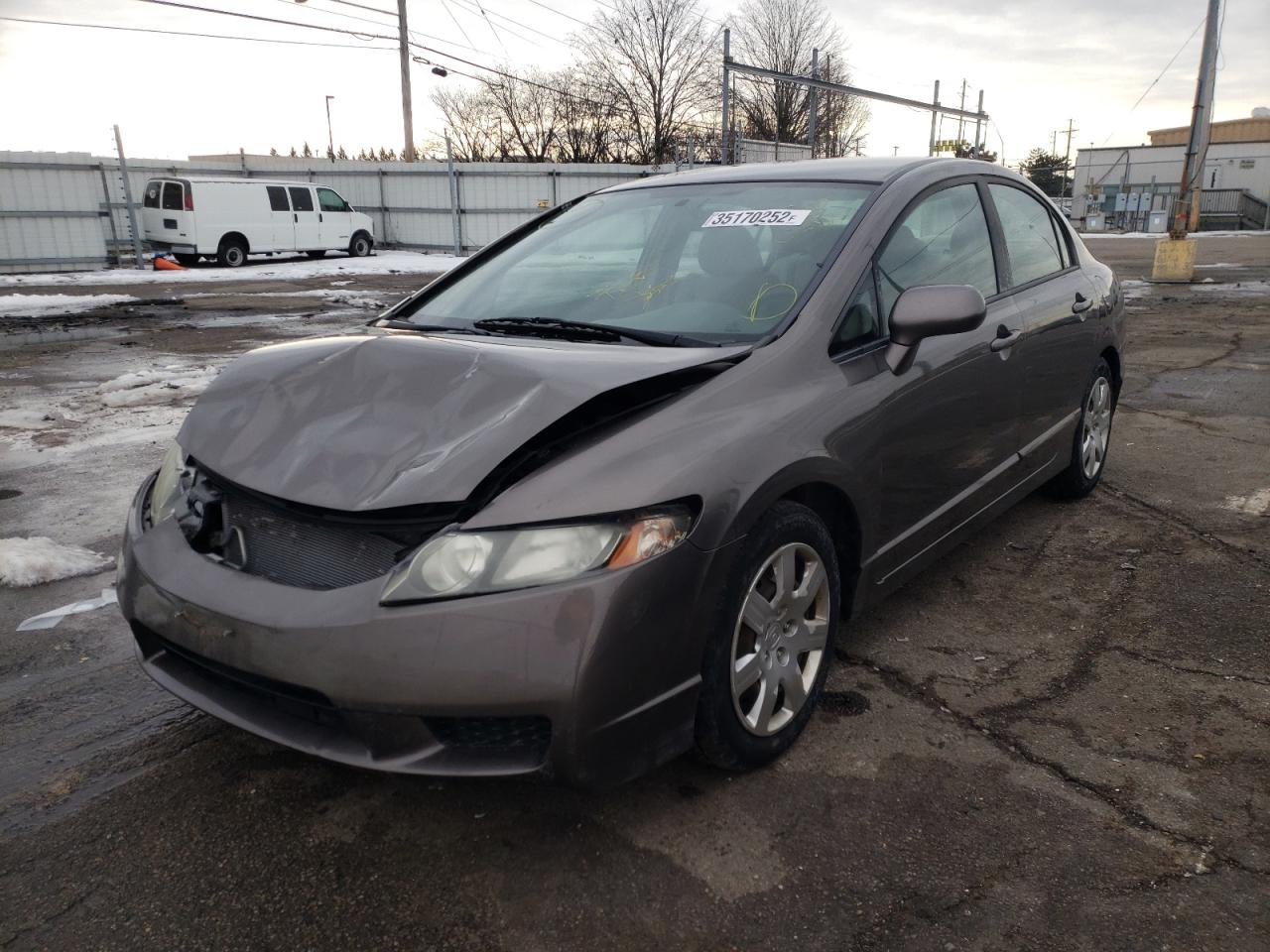 Photo 2 from auction – 2011 HONDA CIVIC LX with VIN 19XFA1F51BE025211