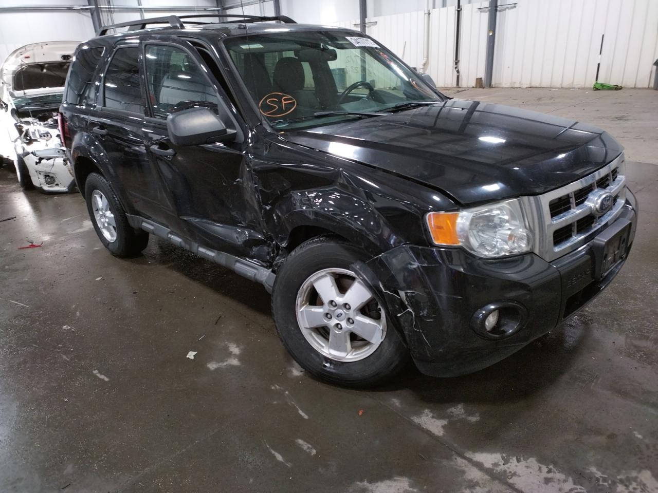 FORD ESCAPE XLT 2011 with VIN 1FMCU9DGXBKB25121 - Photo from auction